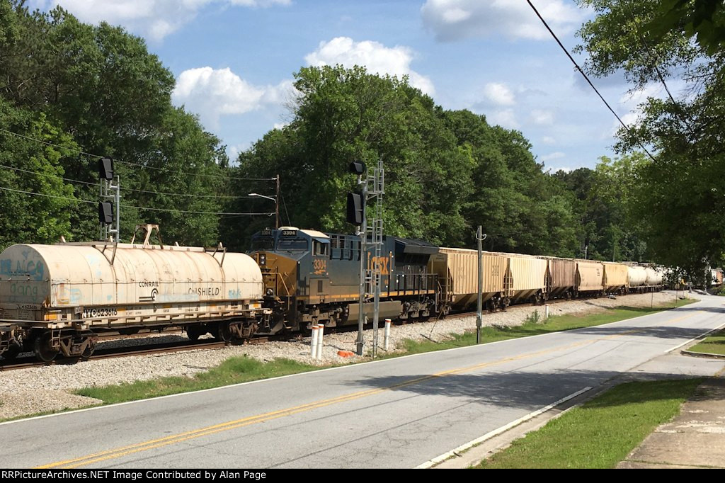 NYC 623616 coil car follows CSX 3304 though the signals